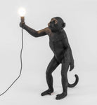 Lampe singe debout noir